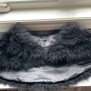 Feather wrap.  Fall 2024 fashion trend.